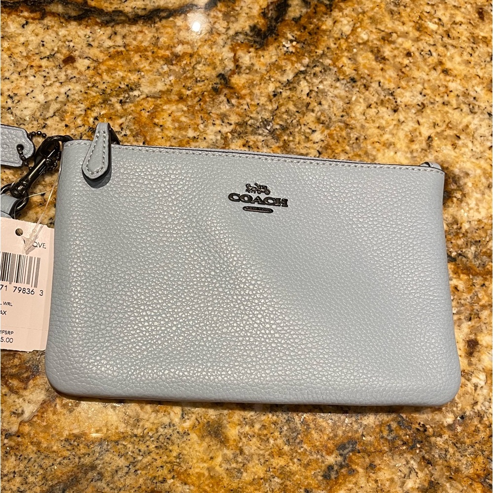 Coach wristlet in polished pebbled leather. NWzt